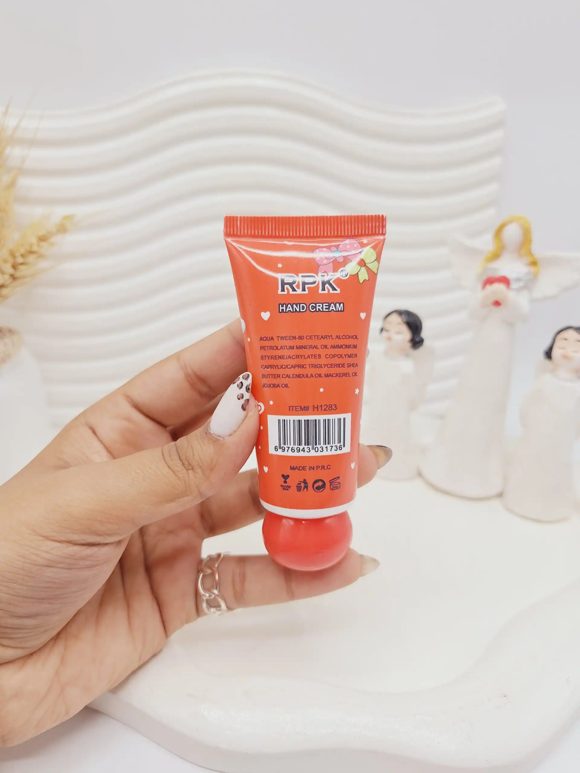 20251102002934706-thumbnail کرم دست کرومی قرمز برند RPK کد 1283 - تصویر 1