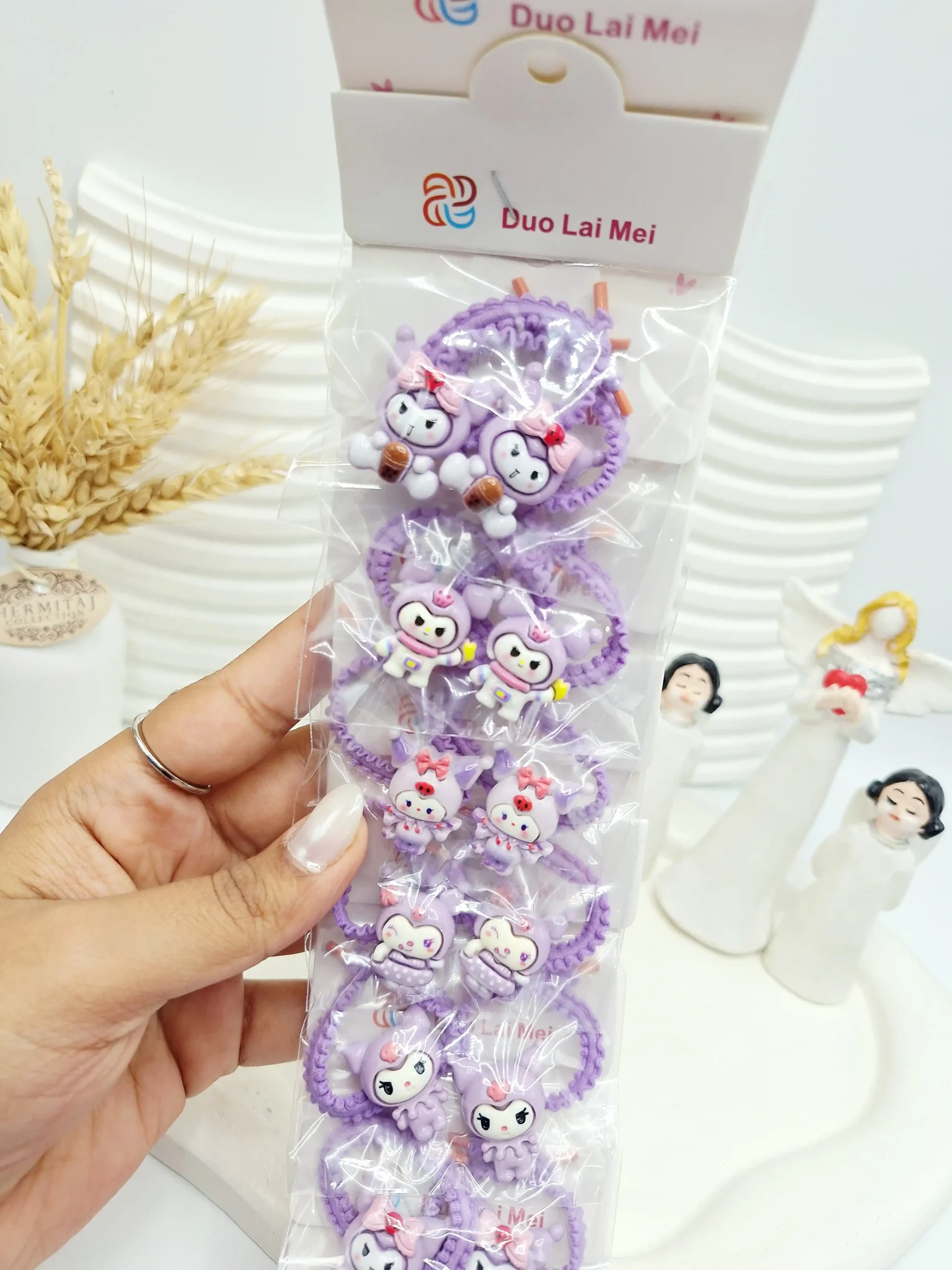 20251117112253738-thumbnail ست 10 تایی کش مو 2 تایی بنفش طرح کرومی بنفش - تصویر 1