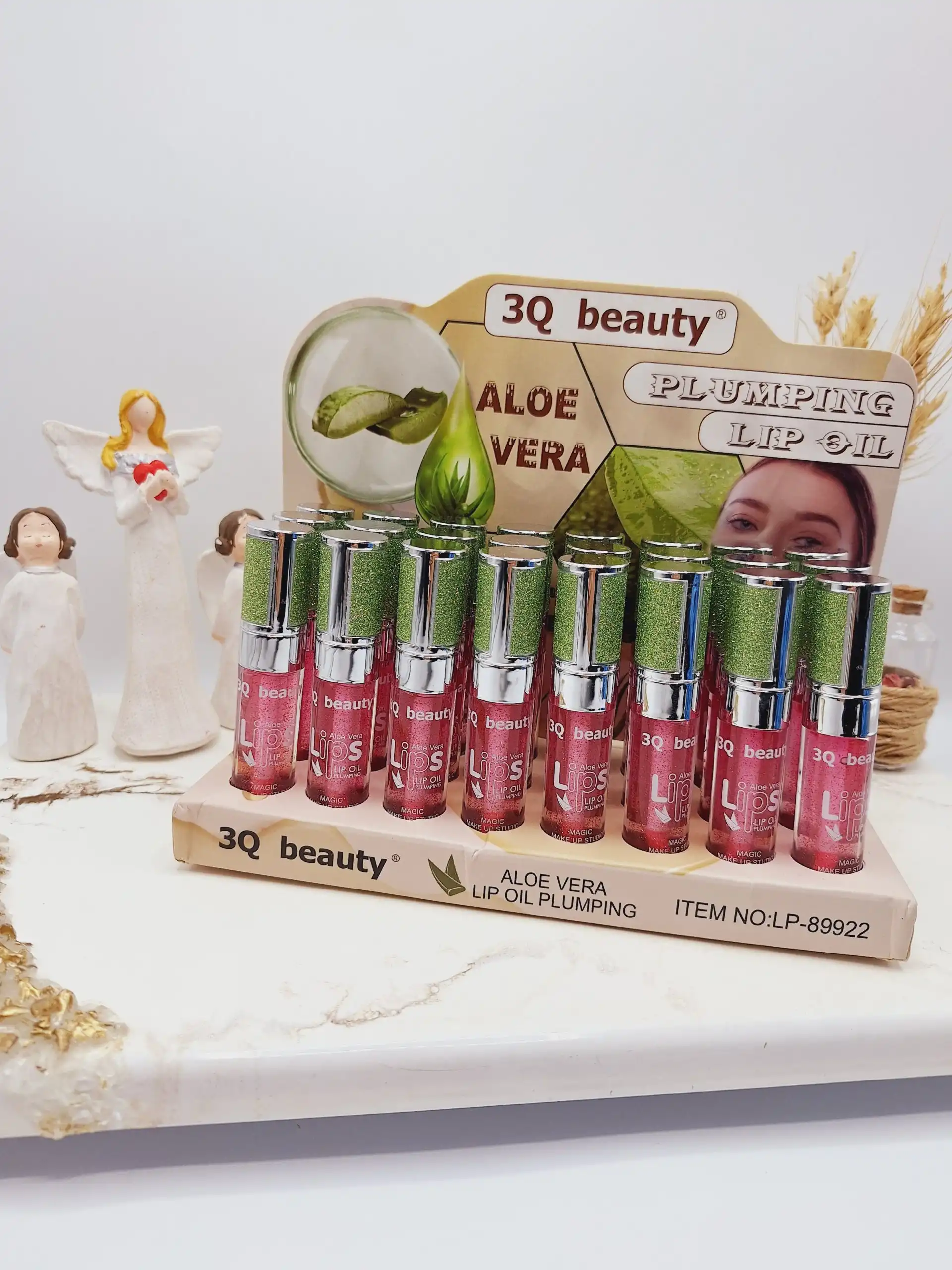 20250731061357766-thumbnail برق لب شاینی صورتی با تقویت کننده لب حاوی روغن لب آلوئه ورا بسیار خوش رنگ برند 3Q beauty کد 899222 - تصویر 1