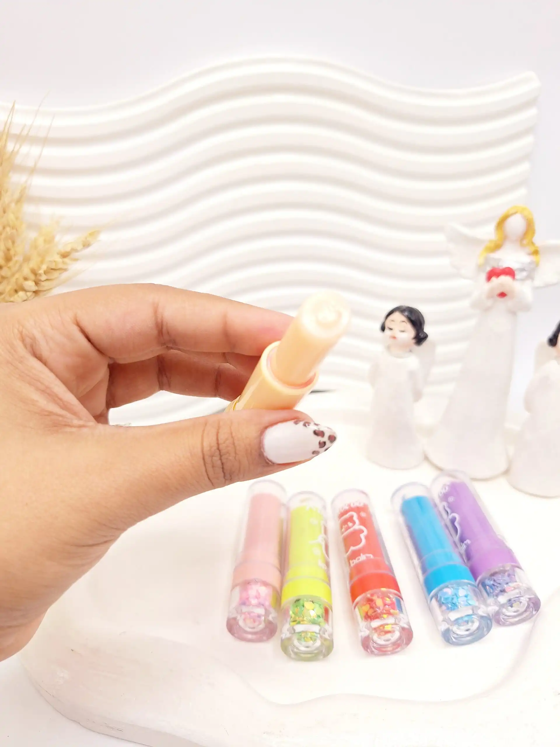 20251102002719337-thumbnail بالم لب پوکه شیشه خرسی بانمک برند Rimocoo - تصویر 1