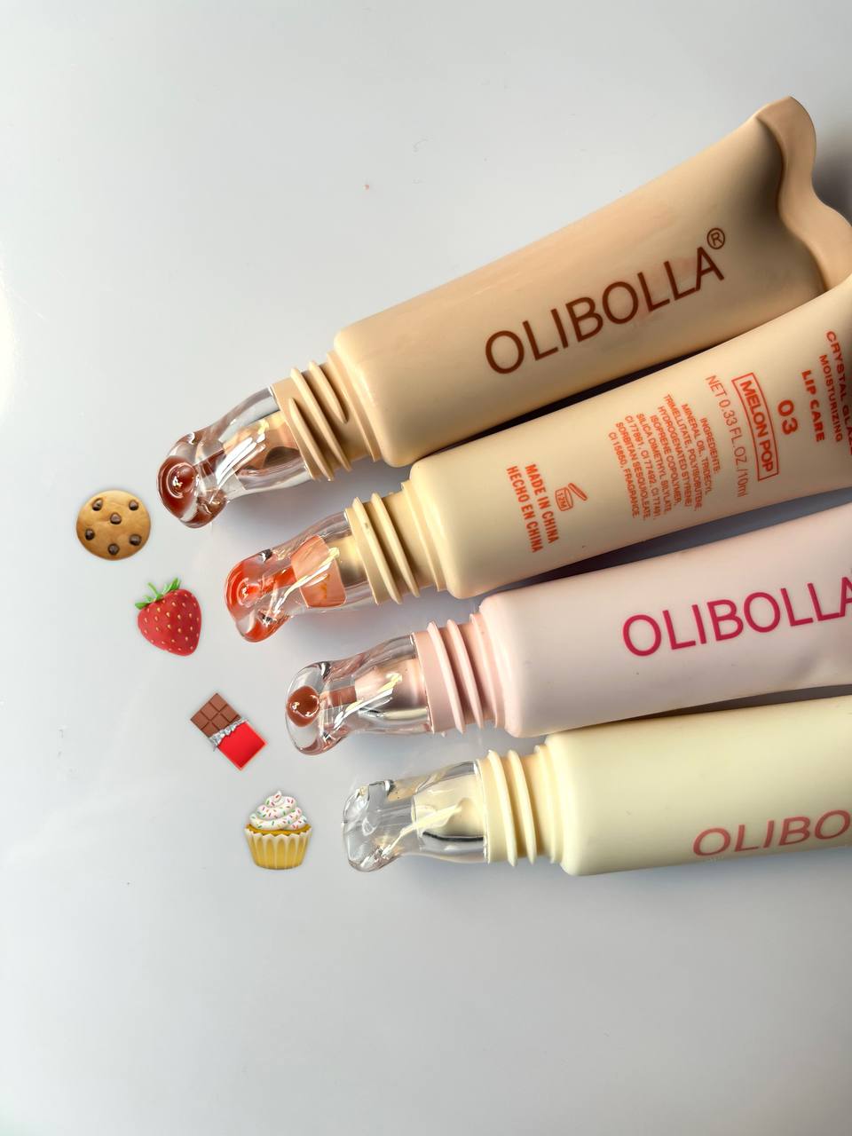 20250731061708556 لیپ گلاس شیشه ای برند OLIBOLLA رایحه کیکی کد LA_L190 - تصویر 1