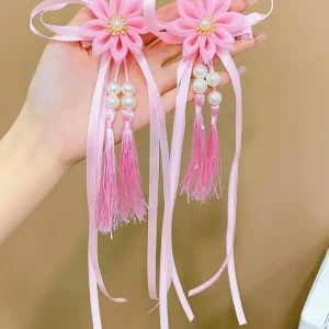 ست 2 تایی گیره مو طرح گل زیبا همراه با آویز نواری و نگین دار