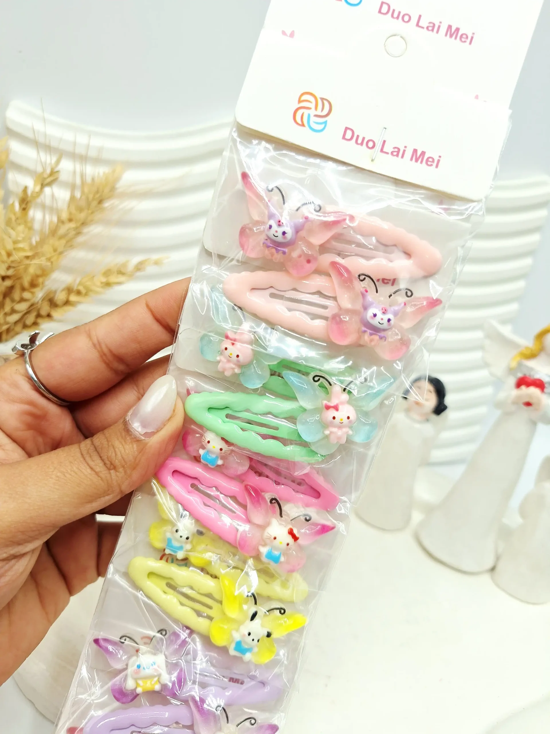 20251118221534939-thumbnail ست 10 تایی پنس مو پروانه طرح استیکر کارتونی - تصویر 1