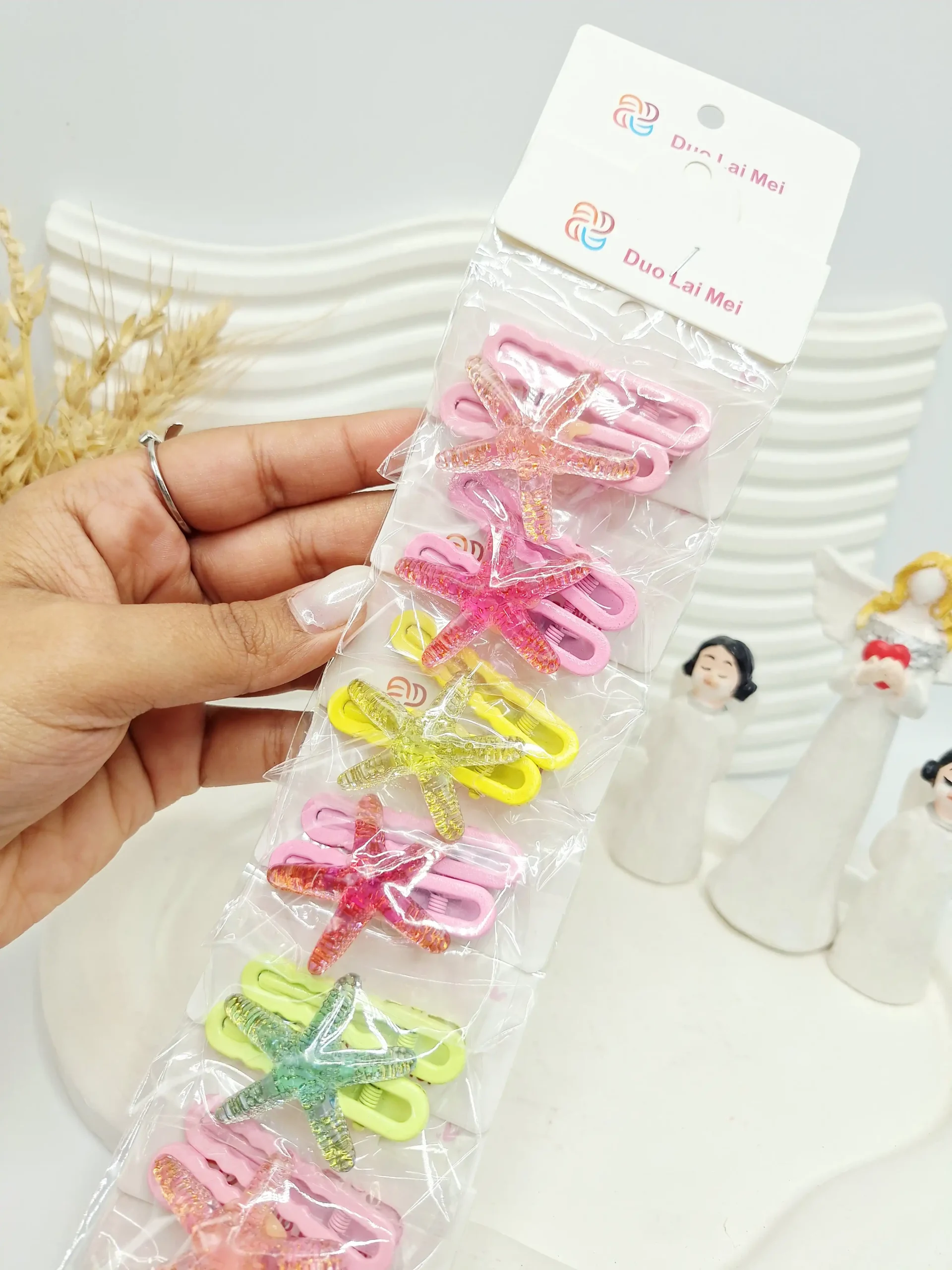 20251118174624177-thumbnail ست 10 تایی گیره مو طرح ستاره دریایی - تصویر 1